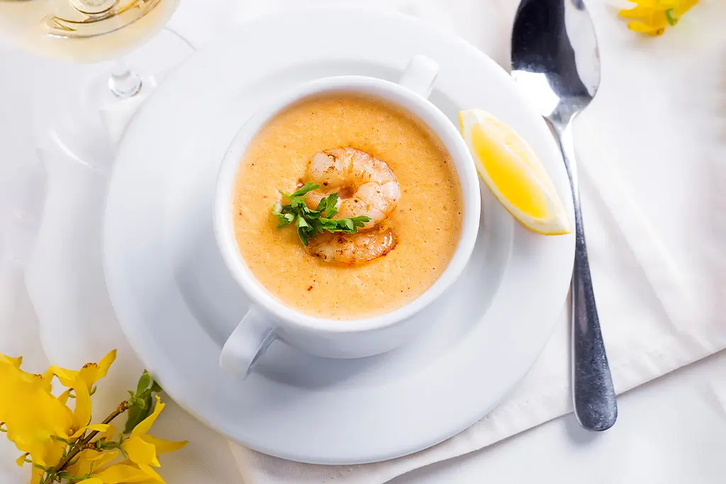 creamy-soup-with-seafood-and-lemon-on-a-white-back-2025-01-09-01-59-36-utc