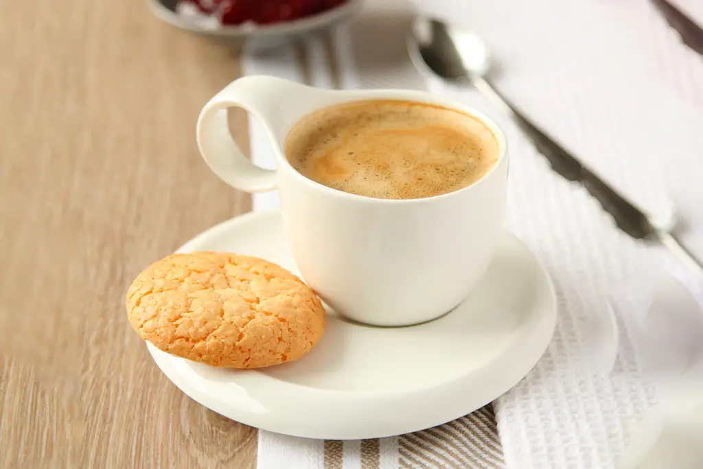 cup-of-espresso-with-coconut-cookies-on-a-plate-2025-03-12-20-36-13-utc