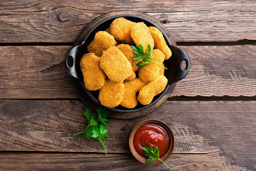 nuggets-chicken-nuggets-with-ketchup-on-wooden-ta-2025-02-18-07-07-19-utc