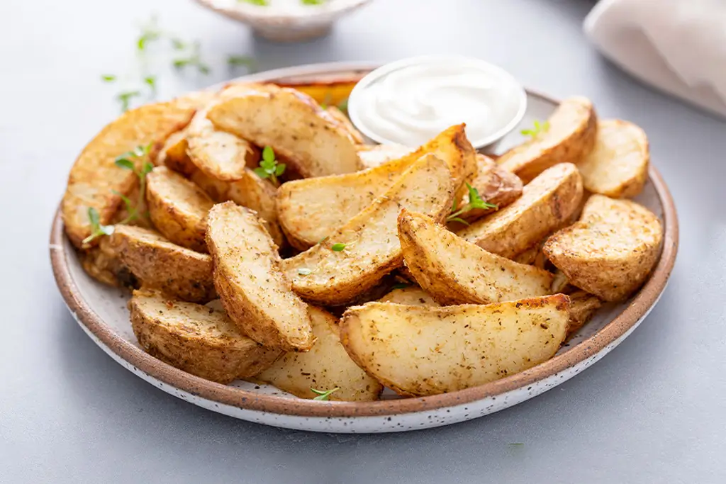 roasted-potatoes-with-parmesan-and-herbs-served-wi-2025-04-12-05-19-52-utc